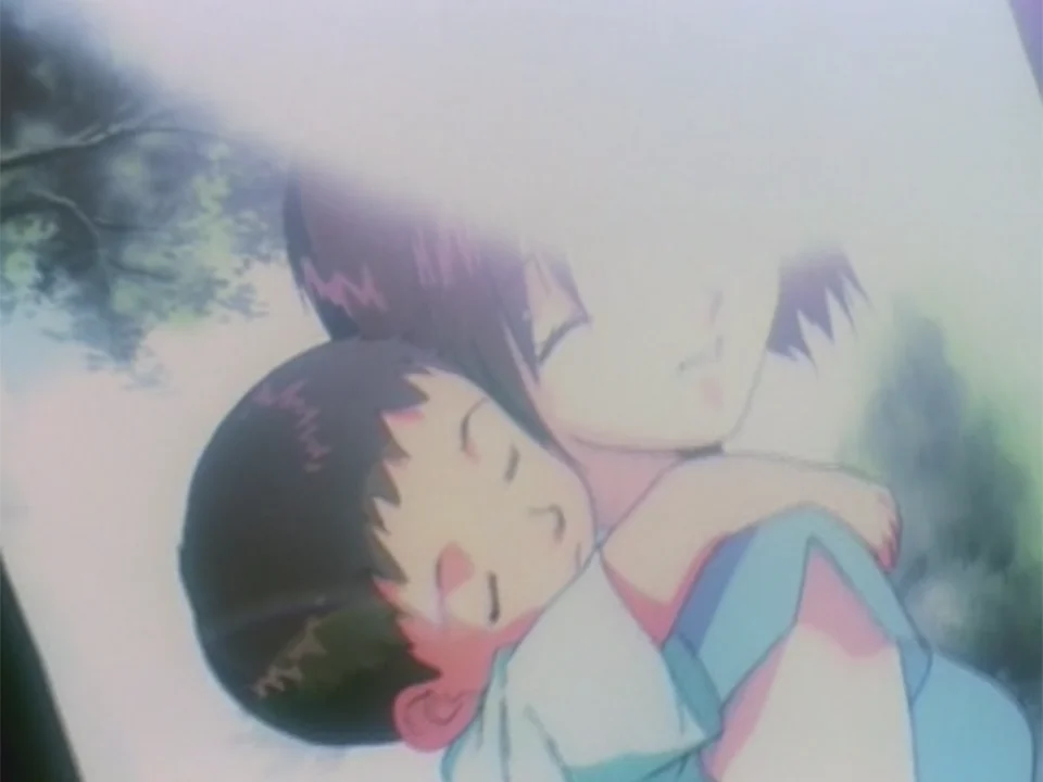 幼いシンジを抱く碇ユイ